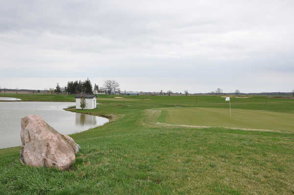 A view of a hole with water coming into play at Empire Springs Golf Club