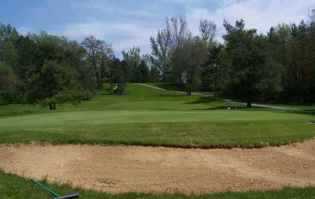 A view of green protected by bunker at Brookside Golf Course