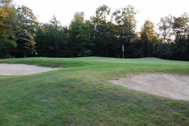 A view of green #2 surrounded by bunkers at Wilson Lake Country Club