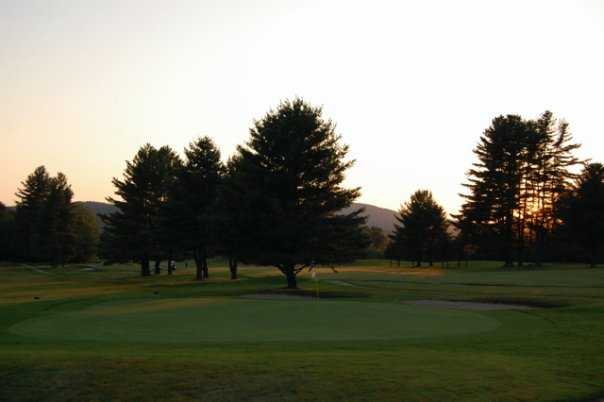A sunset view of the 9th green at Wilson Lake Country Club