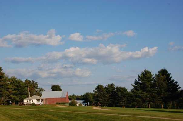 A view from the 6th fairway of the clubhouse at Wilson Lake Country Club