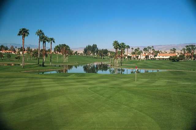 A view of green with water coming into play at Desert Falls Country Club