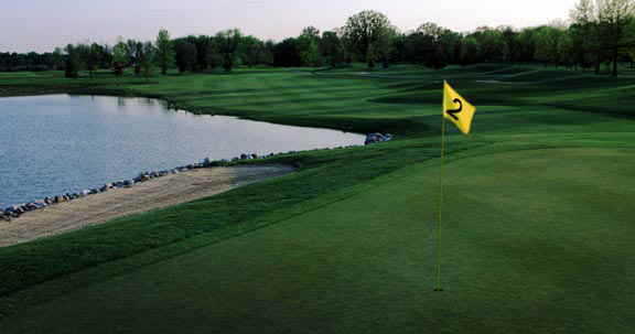 A view of a green with water coming into play at Oak Ridge Golf Club (Joe Wilssens Photography, Inc.)