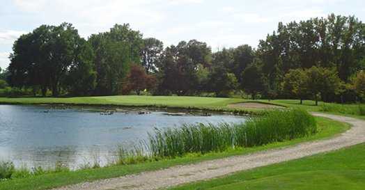 A view over the water of green at Whiteford Valley Golf Club