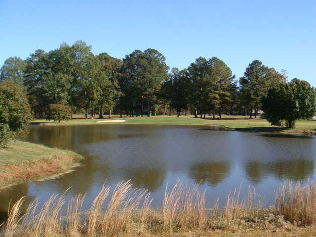 A view over the water of green at Valley Pine Country Club