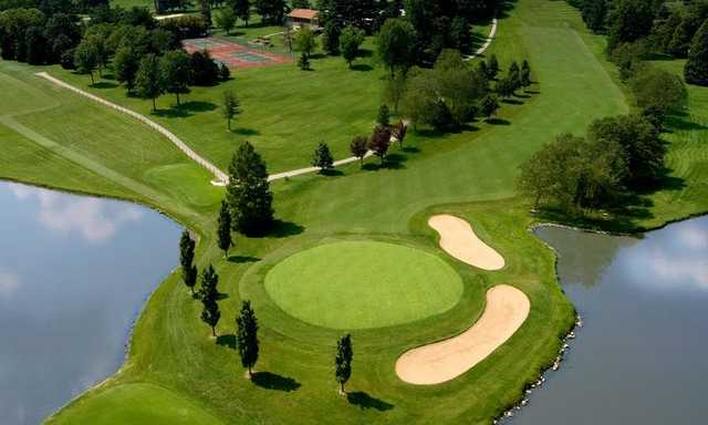 Aerial view of a green surrounded by water at Lockhaven Country Club