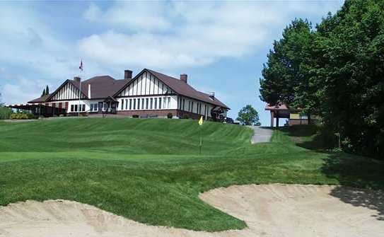 A view of the 18th green with clubhouse in background at Renfrew Golf Club