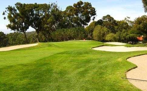 A view of green #11 protected by bunkers (courtesy of Palos Verdes Golf Club)
