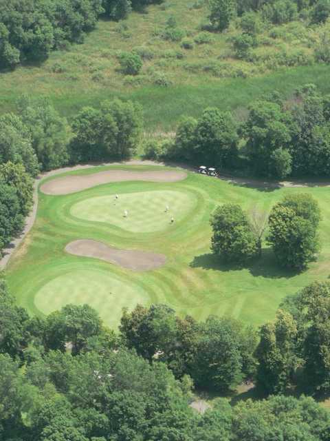 Aerial view of green protected by bunkers at Chomonix Golf Course