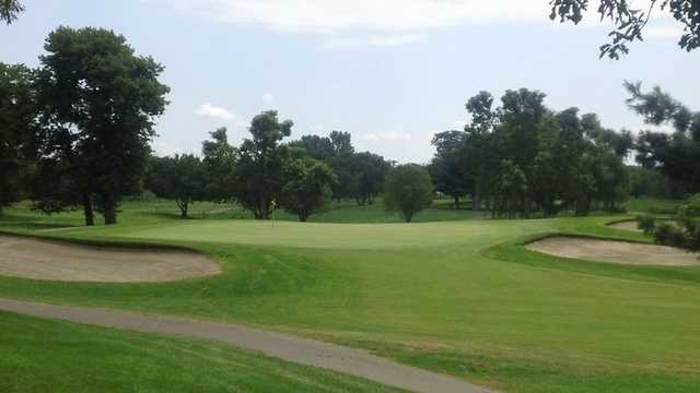 A view of hole #5 flanked by bunkers at Signature Course from Majestic Oaks Golf Club