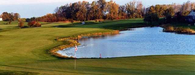 A view of a green with water coming into play at Broken Arrow Golf Club