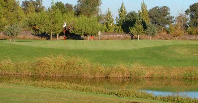 A view over the water of a green at Elkhorn Country Club