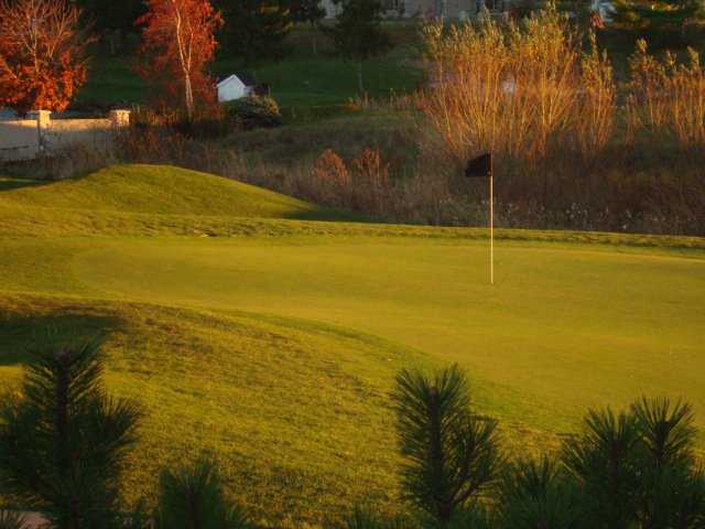 A fall view of a green at Sawmill Creek Golf Resort & Spa.
