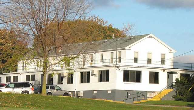 A view of the clubhouse at Maple Lane Golf Club