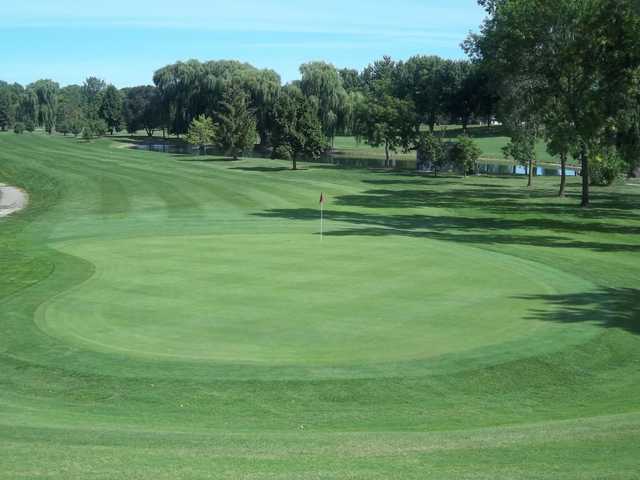 A view of a green and fairway at Green Lea Golf Course