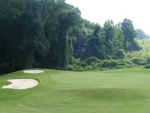 A view of a hole with sand traps on the left at Silo Run Golf Course