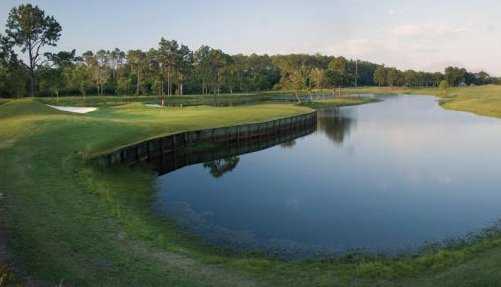 A view of a green with water on the right side at Vista/Dunes Course from Glenlakes Golf Club