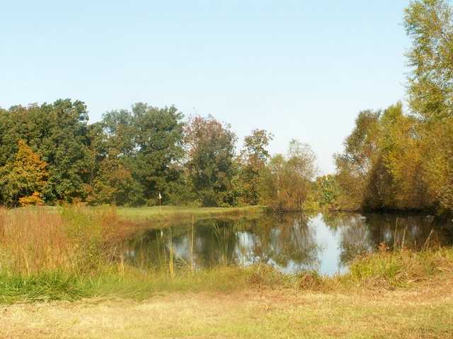 A view of the 16th green and pond at Meramec Lakes Golf Course
