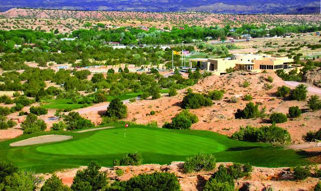 A view of a green protected by sand traps at Towa Golf Resort.