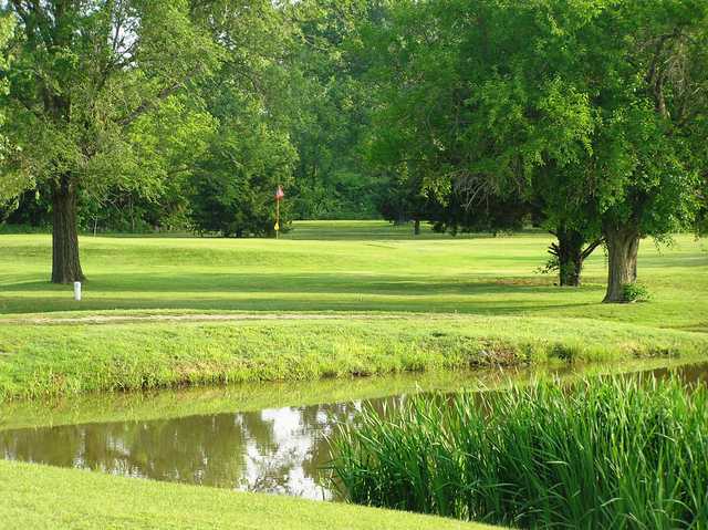 A view over the water of green at Lindsborg Golf Course