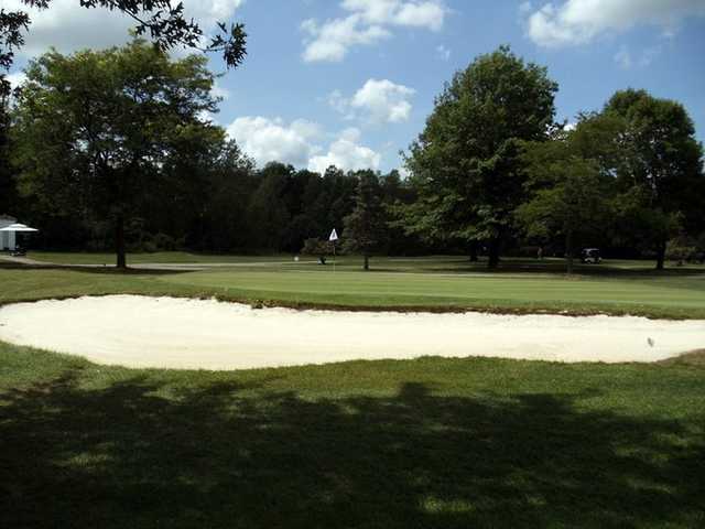 A view of green protected by bunkers at Braemar Country Club