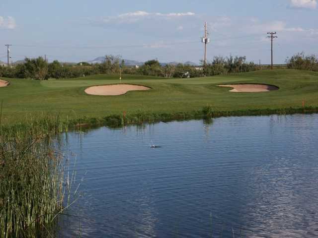 A view over the water of green at Turquoise Valley Golf Course & RV Park