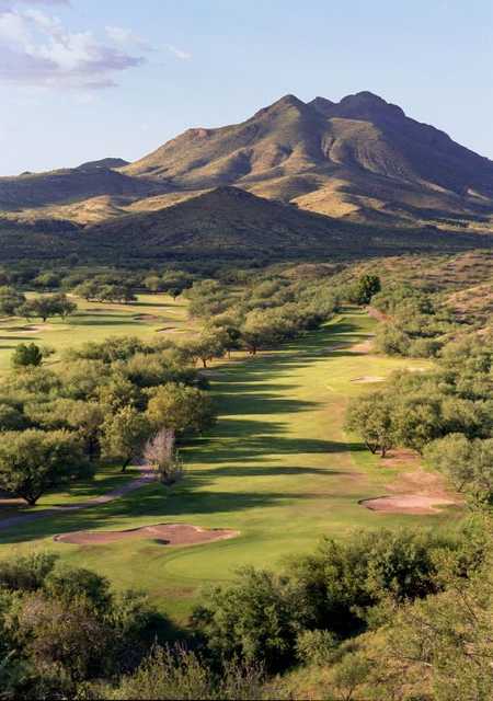 A view of green protected by sand traps and fairway at Rio Rico Golf Club