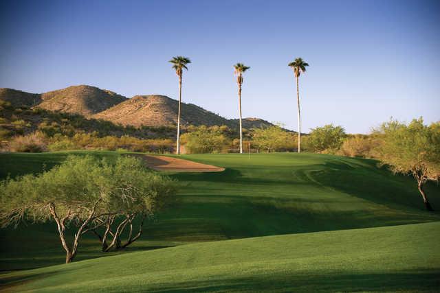 A view of green protected by sand trap at 	Rancho de Los Caballeros Golf Club