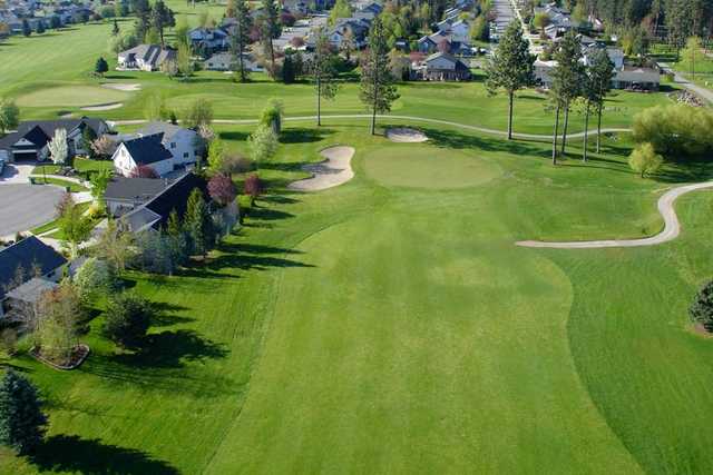 A view of green protected by sand traps at Prairie Falls Golf Club