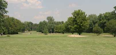 A view of a hole protected by sand trap at Cherry Valley Golf Course