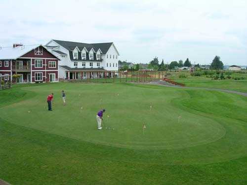 A view of the practice putting green at Homestead Farms Golf Club