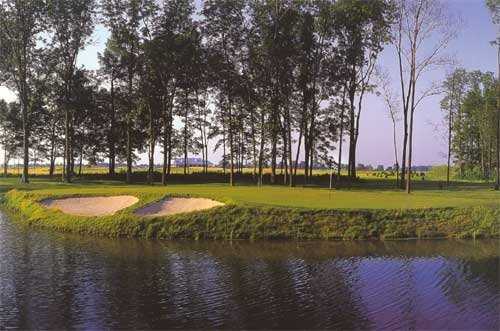 A view over the water of hole #2 at The Links at Heartland Crossing
