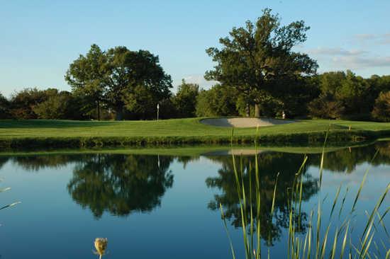 A view over the water of green at Golf Club of Indiana
