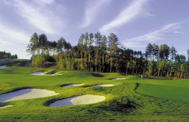 A view of the 14th green at The Wilderness At Fortune Bay