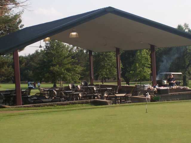 A view of the practice green and the pavillion at Wellington Golf Club