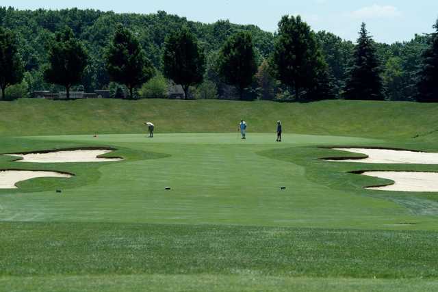 A view of a hole flanked by sand traps at Shawnee Hills Golf Course