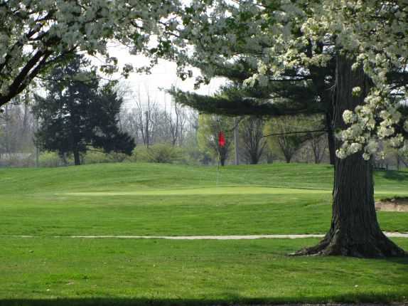 A spring view of a green at Sahm Golf Course