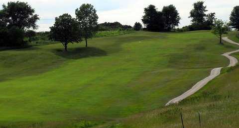 A view of fairway with narrow path on the right side at Hail Ridge Golf Course