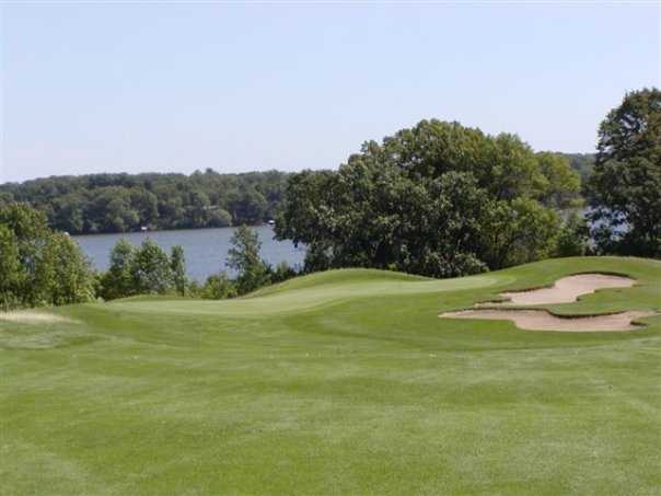A view of hole #18 protected by sand traps at Greystone Golf Club