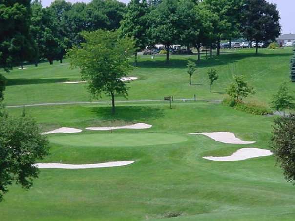 A view of green protected by sand traps at Steubenville Country Club
