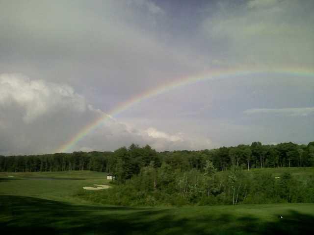 A view of the rainbow over hole #6 at Ridge Course from Blue Ridge Trail Golf Club.