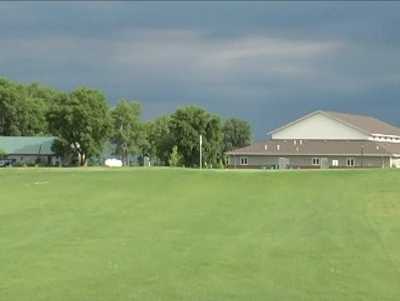 A view of the 9th hole and clubhouse at East Bay 9 Golf Course