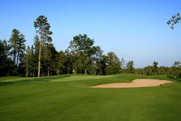 A view of a hole protected by bunker at Bears Den Golf Course