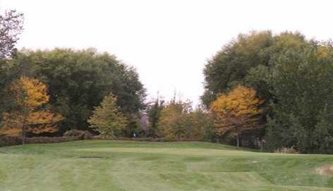 A fall view of a green at Lakeside Golf Course