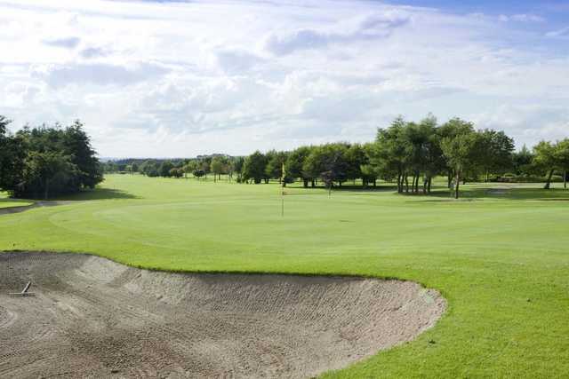 A view of green #14 protected by bunker at Castlewarden Golf Club