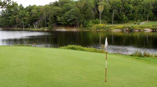A view of green with water coming into play at Seguin Valley Golf and Country Club