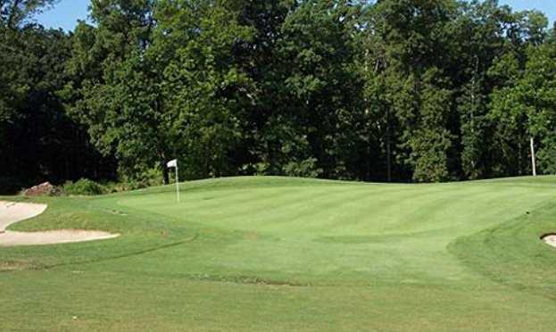A view of green #1 protected by bunkers at West Course from South Hills Golf Club