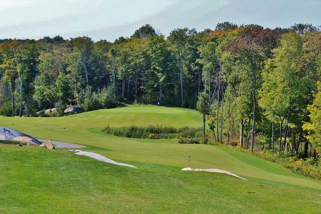 The 16th hole at The Rock Golf Club tumbles downhill over the rocky shield.