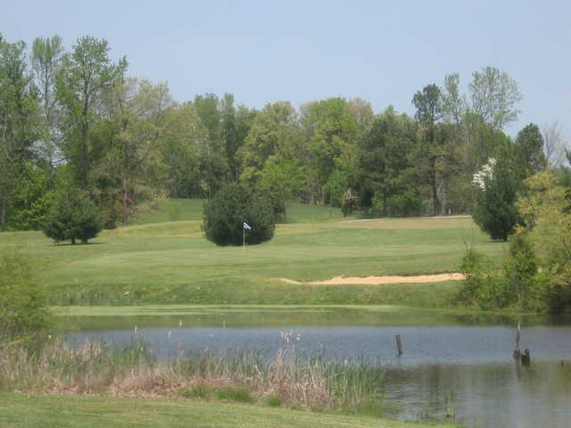 A view over the pond of the 16th green at Southern Hills Golf & Country Club