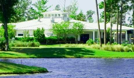 A view over the water of the clubhouse at Magnolia Plantation Golf Club